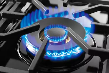 A lit propane stove with blue flames from a Propane Company in Marshall County IL.